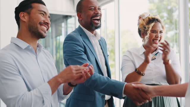 Business people, shaking hands and applause for meeting, agreement and hiring, deal and onboarding partnership. Workers, clapping and handshake for welcome, promotion and b2b networking opportunity