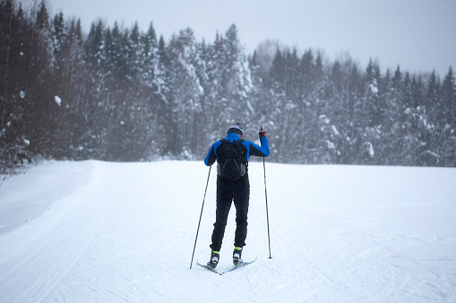 Syktyvkar, Komi, Russia,January 22, 2023,Cross Country skill. Skiing in the winter forest.
