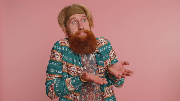 istock Man raising hands asking what why reason of failure demonstrating disbelief irritation by troubles 1460331951