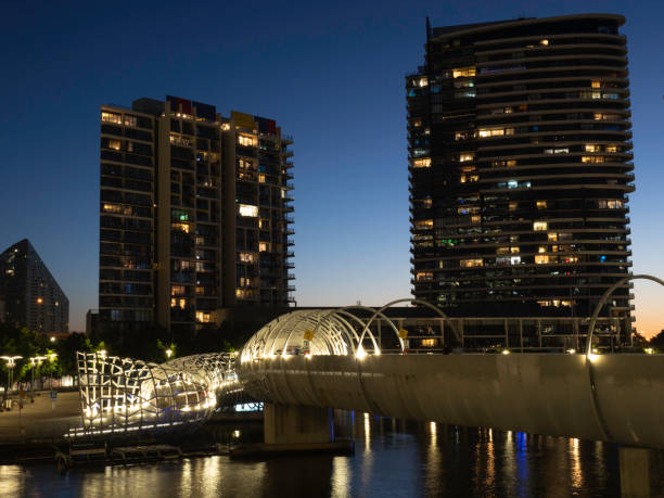 istock Elevated walkway and cityscape at night 1460334267