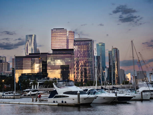 istock Urban skyline, boats and river at sunset 1460334960
