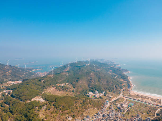 istock Wind power plants on islands beside the sea 1460335355