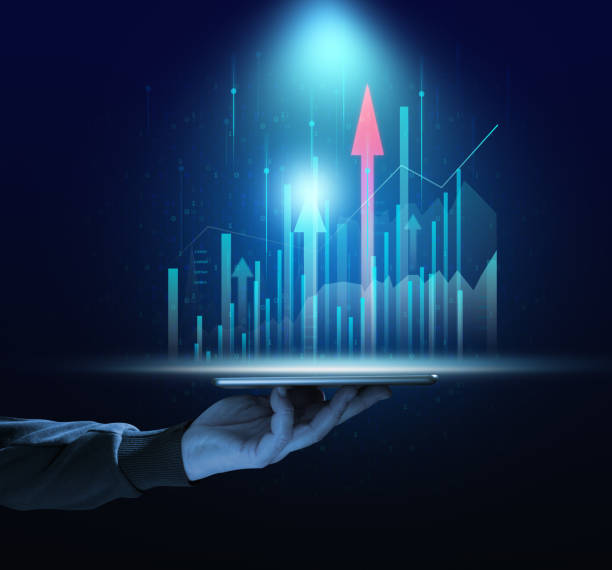istock Holographic graph with growing indicators and a woman's hand. Business growth concept 1460337173