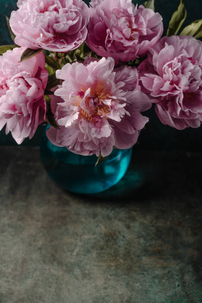 istock Background with pink peonies in vase 1460340449