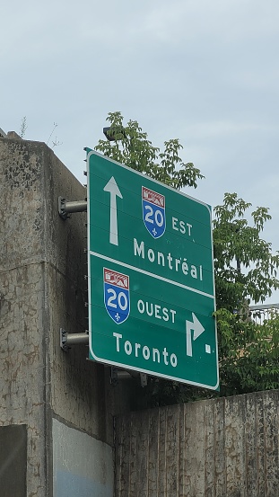 Road sign for Highway 20 towards  Montreal or Toronto