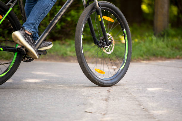 istock walking in the woods on a bicycle, horizontal format 1460348292