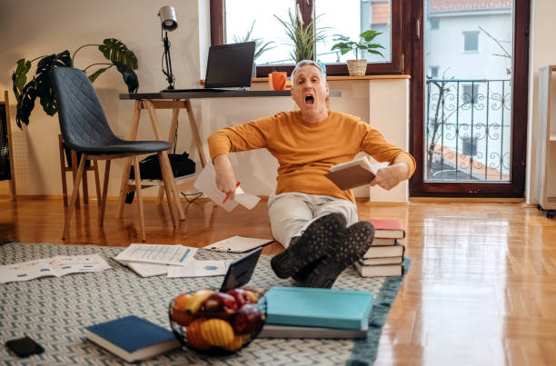 istock Man in further education sitting on floor 1460354188
