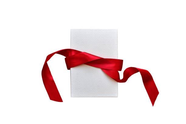 istock White gift box with red ribbon isolated cutout 1460358796