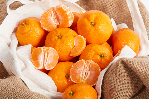 Fresh Organic Tangerine On Fabric