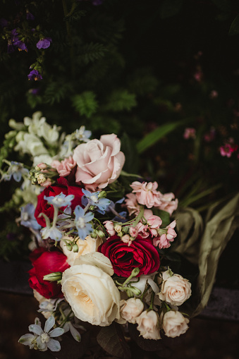 Bouquet of mixed flowers with a greenery background