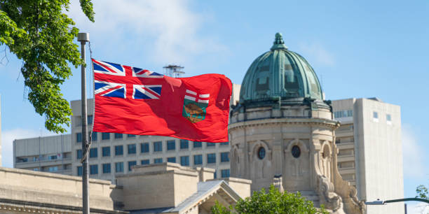 istock Manitoba Provincial Flags at full mast 1460381187