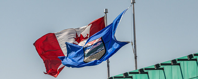 Canada Maple Leaf flag and Alberta provincial flag