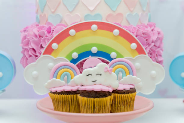 istock Table of birthday sweets with decorated cupcakes. 1460388930