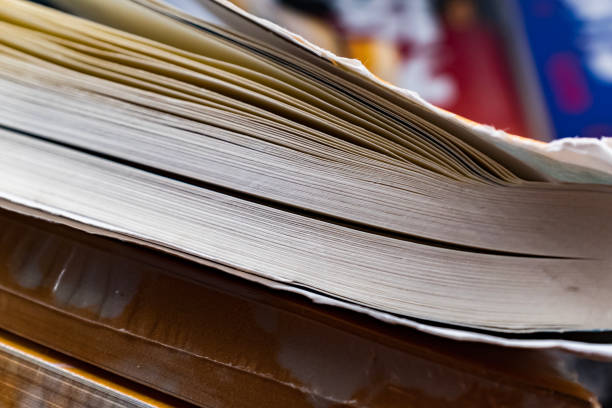 istock Side view of a thick book, macro 1460389177