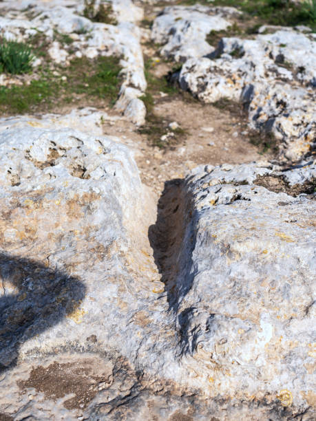 Close-up of cart ruts on the island of Malta at Misrah Ghar il-Kbir (Clapham Junction) stock photo