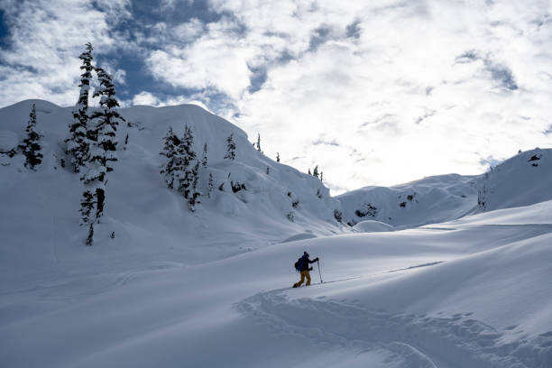 istock Woman backcountry snowboarding 1460397804