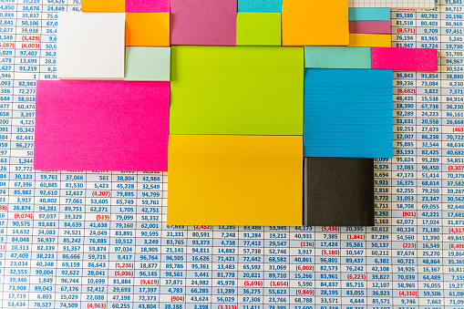 pile of sticky notes on office table