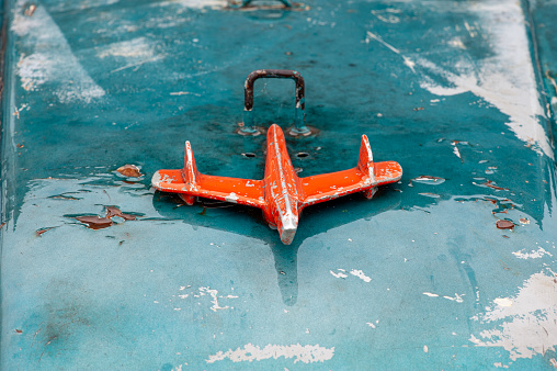 Airplane look red hood ornament from old 4x4