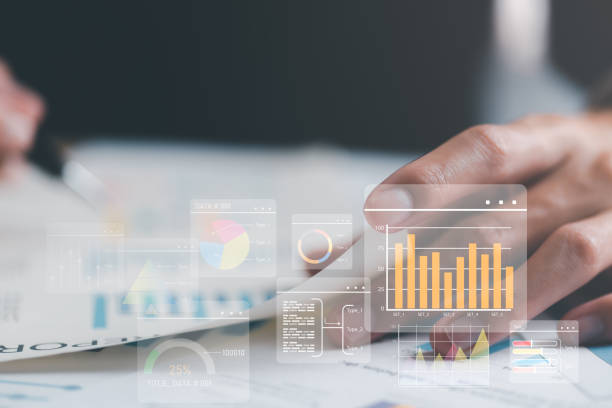 istock Business people read business statistics chart reports, to analyze and improve corporate strategy, manage financial and marketing documents, update annual budget accounts, company growth data. 1460419695