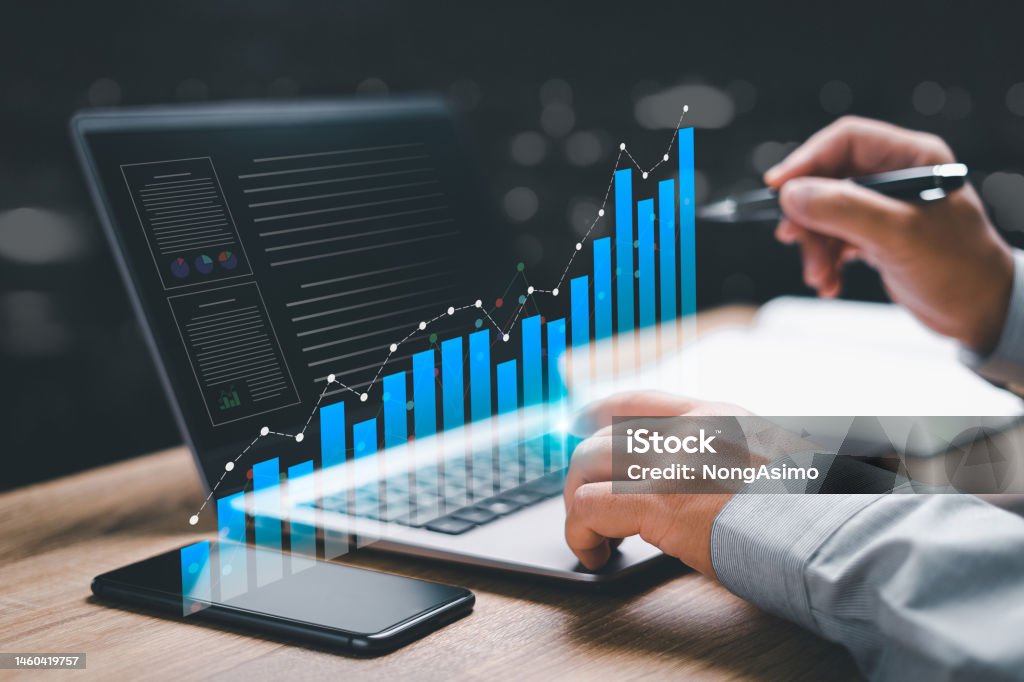 Business finance data analytics graph chart and smart digital marketing management concept, Businessman use the laptop to work marketing analysis chart strategic planning for sustainable development Growth Stock Photo