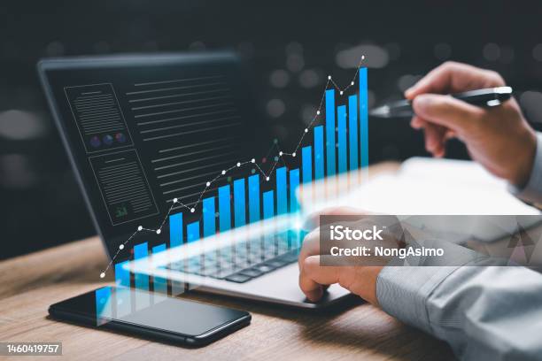 Business Finance Data Analytics Graph Chart And Smart Digital Marketing Management Concept Businessman Use The Laptop To Work Marketing Analysis Chart Strategic Planning For Sustainable Development Stock Photo - Download Image Now