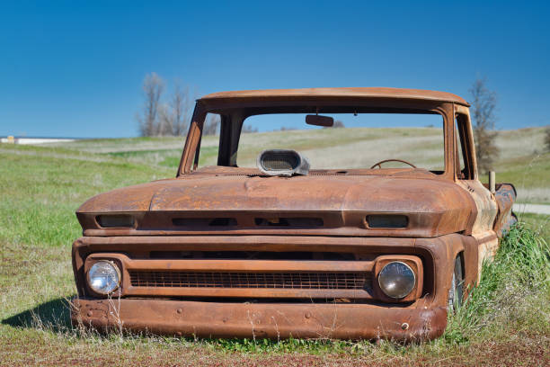 istock Rusty Vintage Pickup in the Field 1460425400