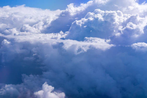 istock Clouds view from the plane. Clouds are moving on camera. Flying through the cloud. Travel by air. Perfect for cinema, background 1460429895