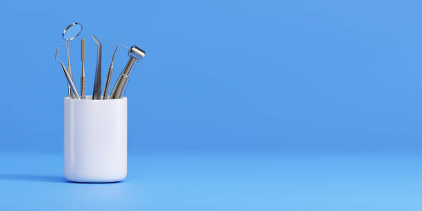 istock 3d realistic professional dental tools set for dentistry inspection. Teeth care, health concept. Basic metal medical equipment, instrument. Vector illustration isolated on blue background 1460436138