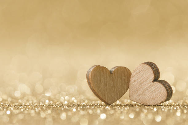 Two hearts on bokeh background stock photo