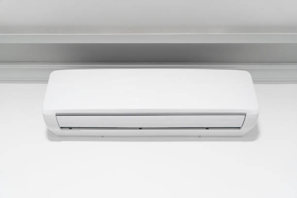 istock Air condition indoor unit compressor in room interior. Split air conditioner machine on the wall. Air compressor. 1460443970