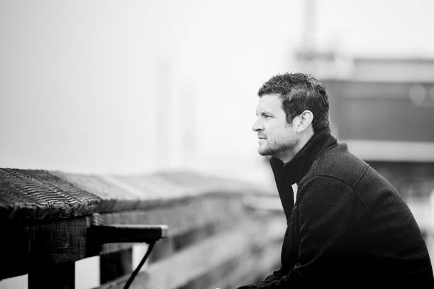 istock Grayscale shot of a Caucasian (White) looking and thinking 1460447065