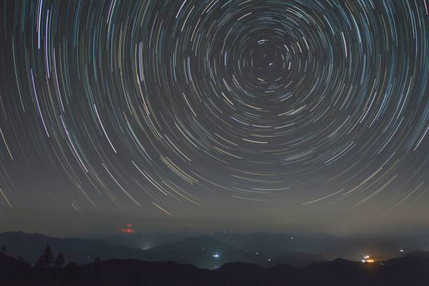 istock Beautiful shot of circular light trails in a night sky 1460448331