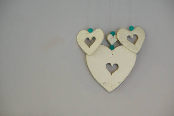 istock Beautiful heart-shaped decoration hanging on the wall 1460449029