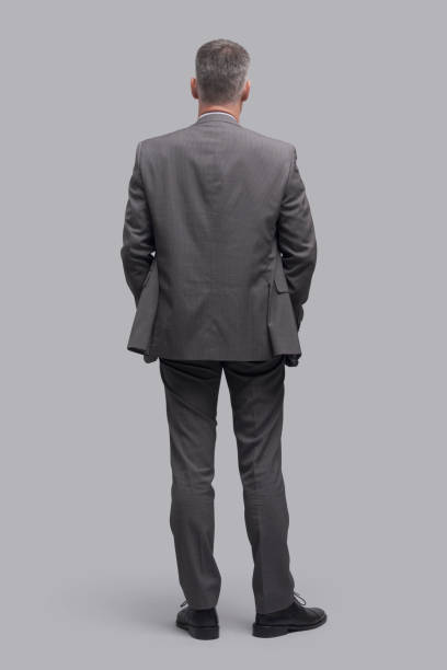 istock Corporate businessman standing back view 1460449931