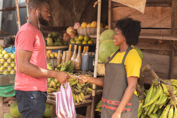 istock African man doing grocery shopping in a market 1460452462