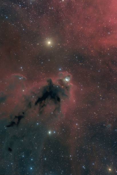 istock Vertical shot of a galaxy with stars and space dust. 1460454635