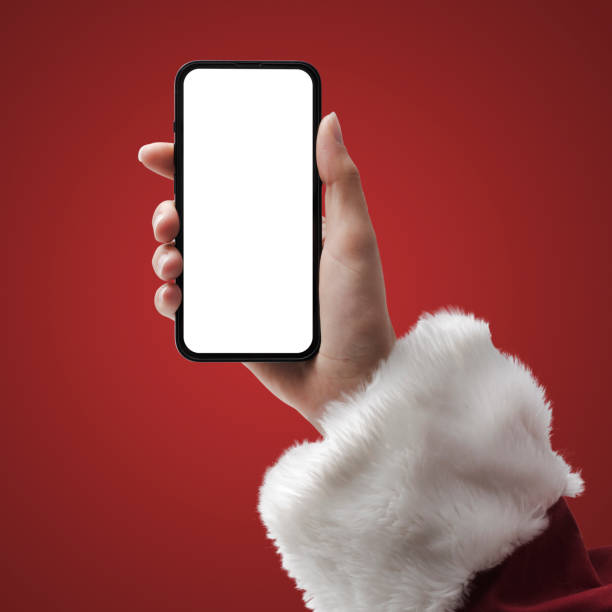 istock Santa Claus holding a smartphone 1460454729