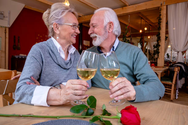 istock A mature romantic couple in a restaurant. 1460456572