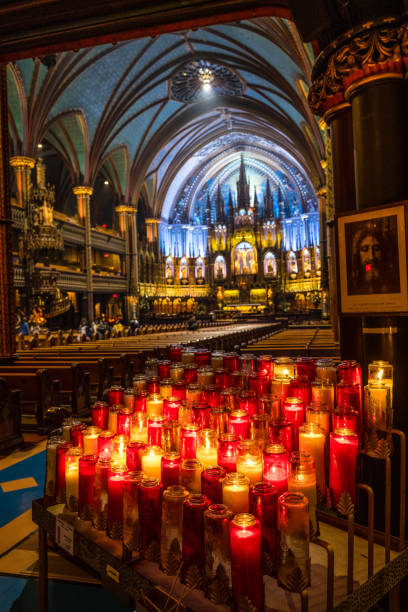 istock Candles burning peacefully in Montreal Notre-Dame Basilica, Canada 1460459053