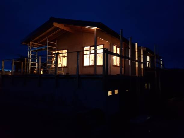 istock Large house in renovation at night 1460461362