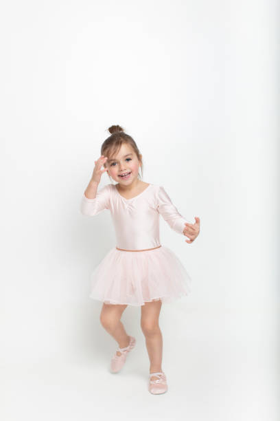 istock Girl dancing ballet in a studio 1460461616