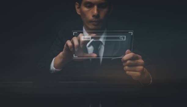 istock Concept of data search and engine optimization, a man searching information on an internet network 1460462579