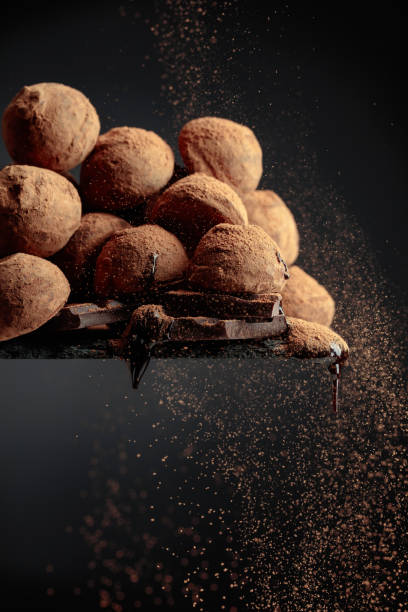 istock Chocolate truffles sprinkled with cocoa powder. 1460463161