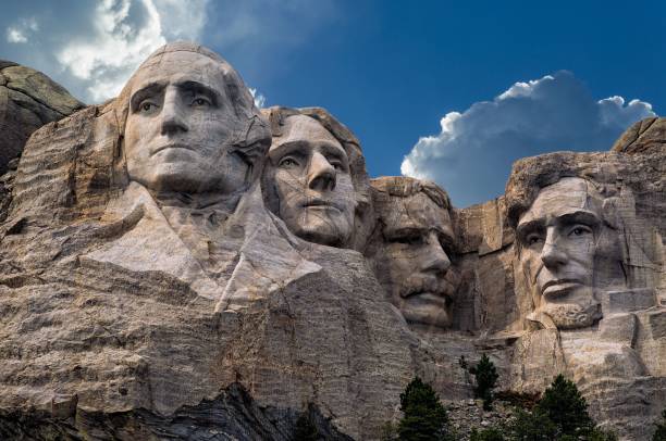 istock Sculpture memorials at Mount Rushmore against blue cloudy sky 1460463296