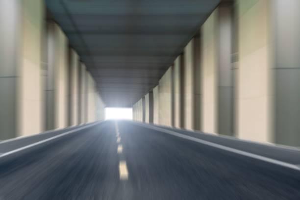 istock motion blurred empty asphalt highway in  modern city 1460465385