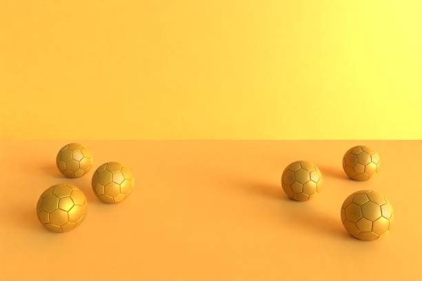 istock six gold-colored football balls 3d rendering 1460466687
