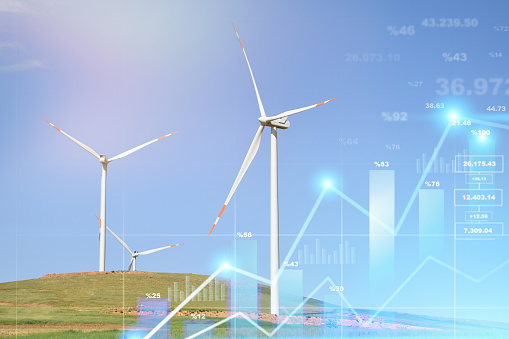 Energy prices rising concepts. Finance and economic growth in energy costs. Wind turbines with financial graphs, analyzing data of power and energy prices, renewable energy sources, energy crisis