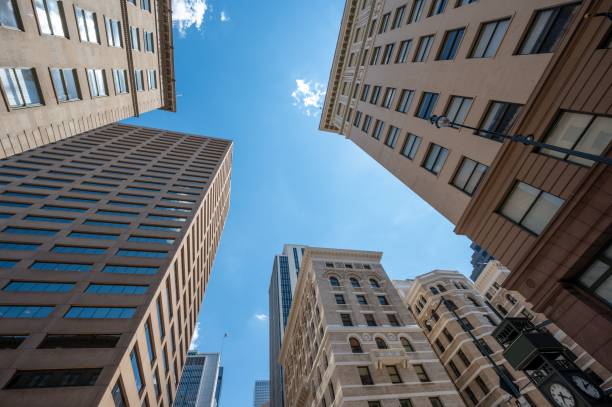 istock Low-angle shot of modern buildings on a sunny day 1460470040