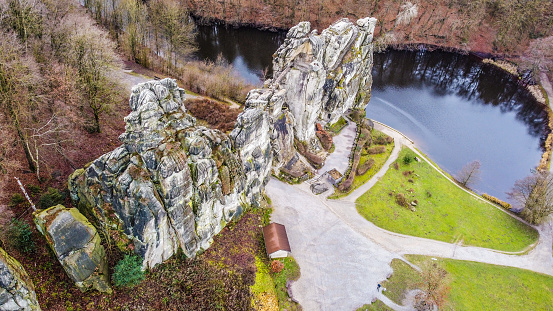 An aerial view of the Externsteine rock formation in the Teutoburg Forest in Germany