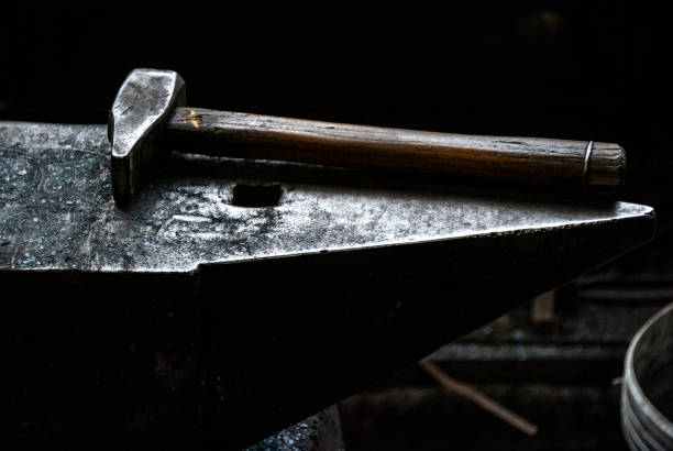 istock Closeup shot of a hammer in the forge 1460470515